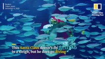 Coronavirus Christmas- In Japan, a diving Santa Claus in an aquarium brings joy