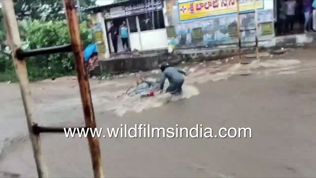 Truck weight brings down bridge_ Roads submerged, motorbike carried away by Telangana floodwaters