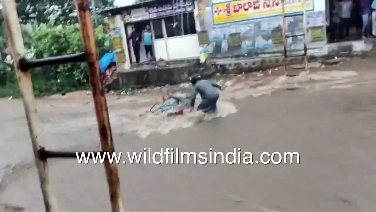 Truck weight brings down bridge_ Roads submerged, motorbike carried away by Telangana floodwaters