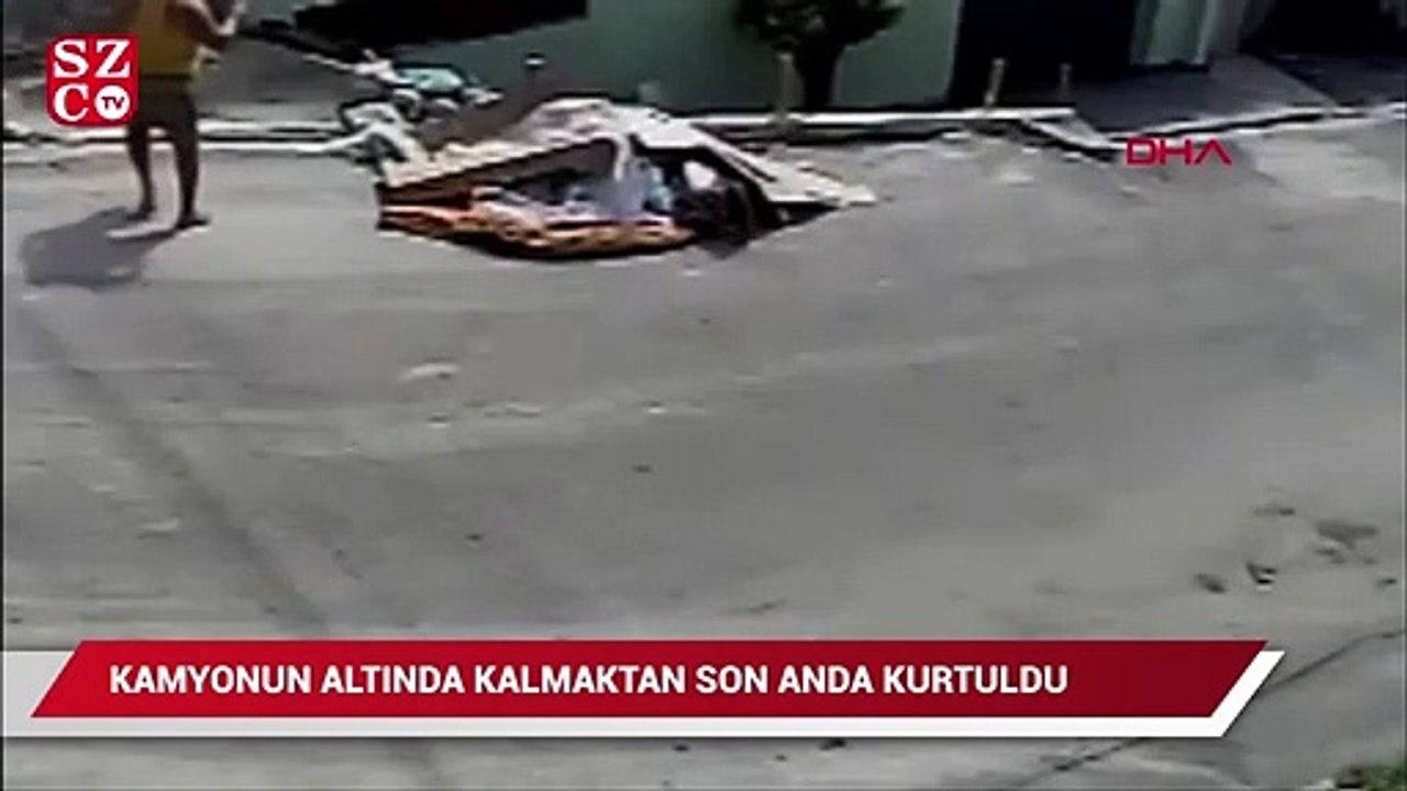 Freni boşalan kamyonun altında kalmaktan son anda kurtuldular