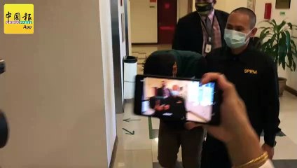 收贿1万2000加速放人 移民官员俯首认罪(1)