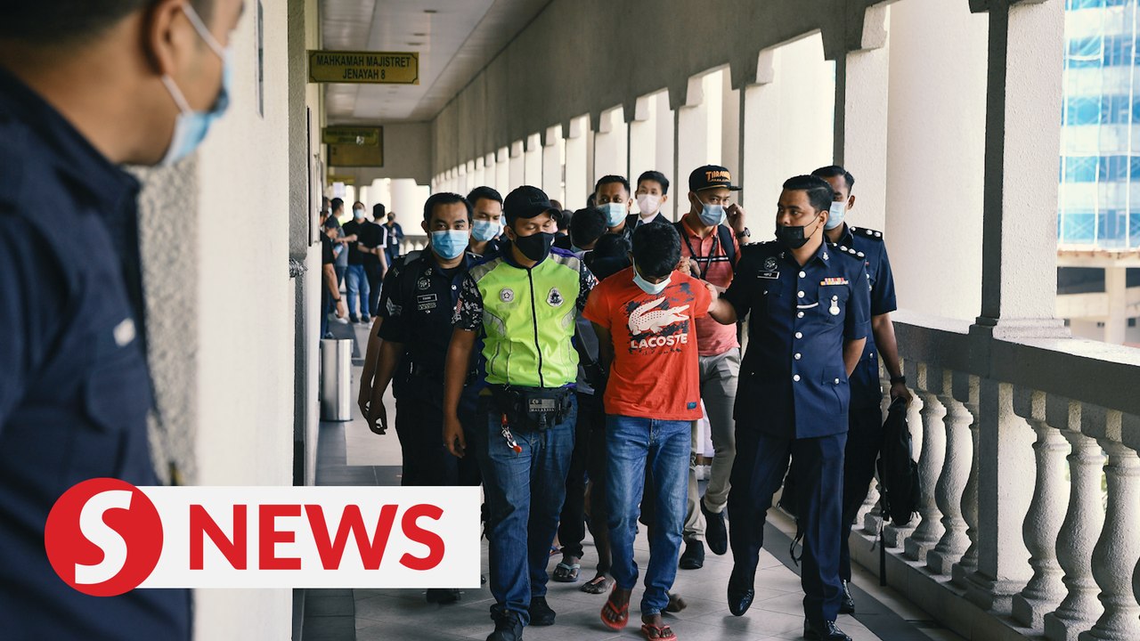 Four charged with murdering former Mardi researcher