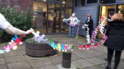 SLEAP Charity hanging bunting with 1000 people to represent those helped