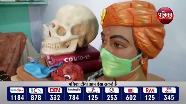 मूर्ति के जरिए कोविड से बचाव का संदेश
