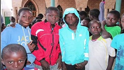 Plus de 1400 jackets distribués :  Mamadou Diagne Sy Mbengue au chevet des talibés dans le froid