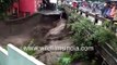Himachal Pradesh flood and landslide_ Flooded river, cars submerged in flood debris