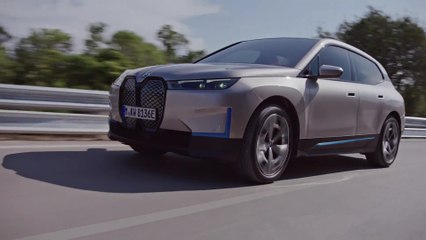 The BMW iX in Sand Gold Driving Video