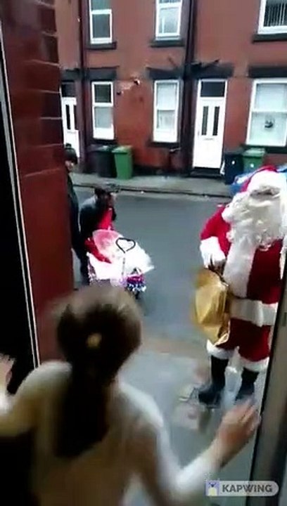 Santa Claus surprises Beeston children with gifts leaving them 'beaming with joy'