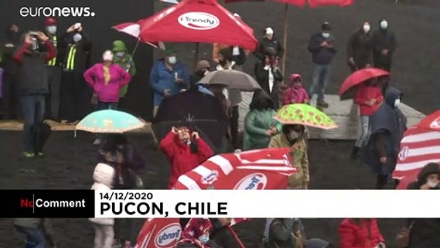 Spectators brave heavy rain to see solar eclipse in Chile