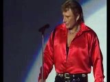 Johnny Hallyday Électrise Bercy avec 'L'Hymne à l'Amour' en 1995 - Un Moment Inoubliable!