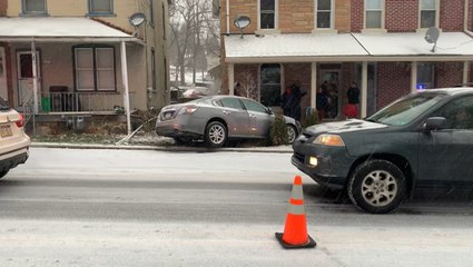 Car crashes into Pennsylvania home as snow slickens roads