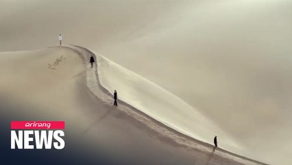 Catwalk on a sand dune's crest - Saint Laurent takes distancing in its stride