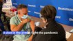 US healthcare workers begin receiving COVID-19 vaccine