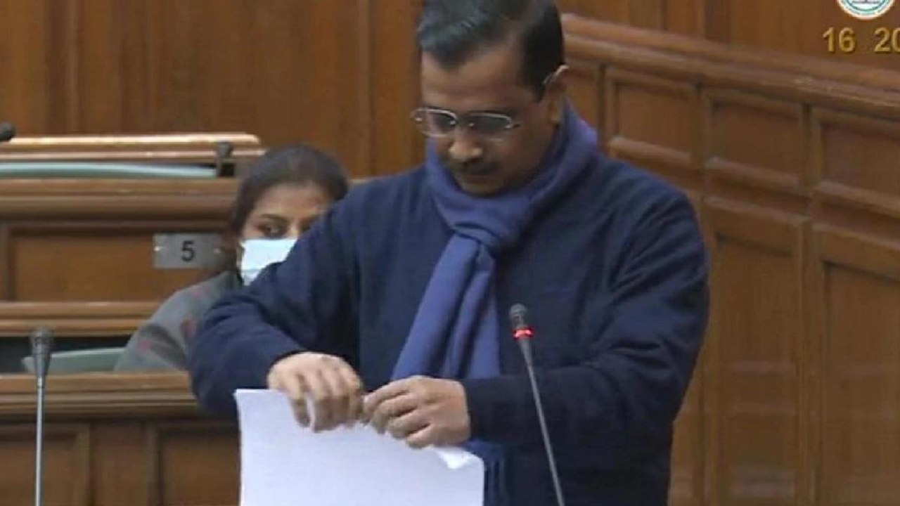 Delhi CM Arvind Kejriwal tears farm law copies