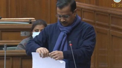 Delhi CM Arvind Kejriwal tears farm law copies