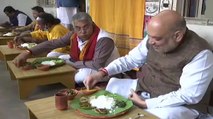 Amit Shah eats lunch at Bengali folk singer's house