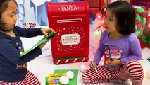 Emma and Kate Pretend Play Christmas Playhouse visiting the North Pole