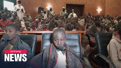 Tears of joy as parents hug freed Nigerian schoolboys