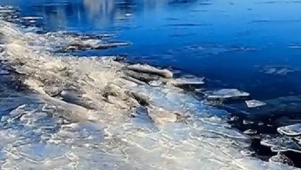 Ice crashes together along lakeshore