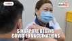 Singapore begins Covid 19 vaccinations marking 'new chapter' in virus fight