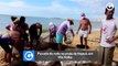 Puxada de rede na praia de Itapuã, em Vila Velha