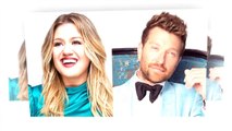 Kelly Clarkson hugs Brett Eldredge cry in happy, as he gives her an early Christ