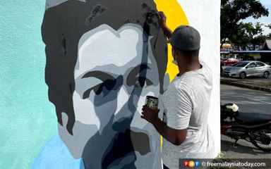 Artist’s mural of Penang football greats gets heads turning
