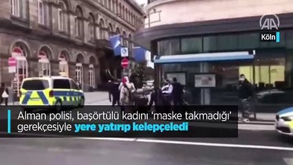 Alman polisi, başörtülü kadını 'maske takmadığı' gerekçesiyle yere yatırıp kelepçeledi