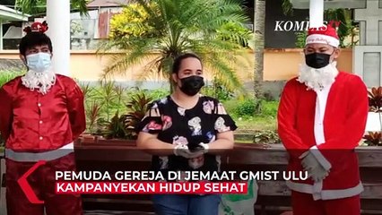 Pemuda Gereja Bagi Masker di Pasar