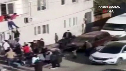 Sinir krizi geçirip pencereden atlamaya çalışan kızı babası kurtardı
