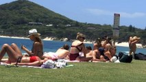 Experts urge Aussies to slip slop slap despite wet summer