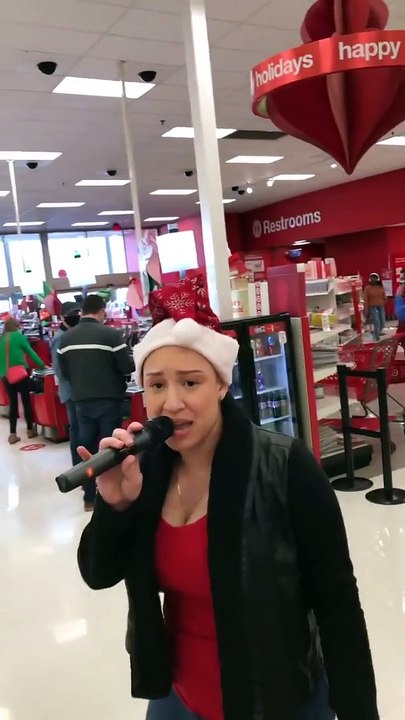Melanie Amora Kills Christmas Carol At Target Store