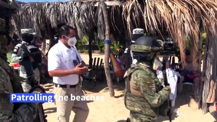 Mexico: Soldiers patrol beaches, ensure tourists follow virus measures
