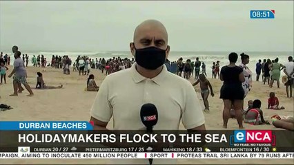 Holidaymakers in Durban flock to the sea