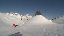 Skier Faceplants to the Snow While Attempting Spin Over Mound of Snow
