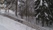 Guy Slips And Slides Down Stairs While Skiing On Handrails