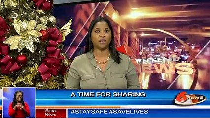 A time for sharing: Minister Donna Cox hamper distribution