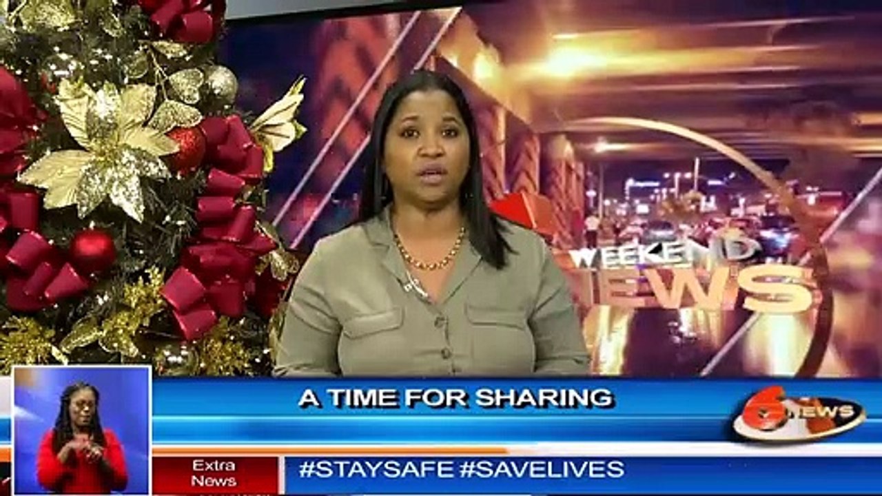 A time for sharing: Minister Donna Cox hamper distribution