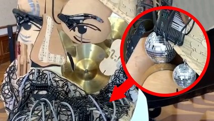 Artist pieces together old electronics to form illusion of a face