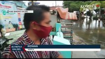 Debit Air Turun, Aktivitas Warga di Kawasan Banjir Desa Pekauman Ulu Berangsur Normal