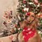 Dog Dressed As Reindeer Enjoys Christmas Treats From Owner