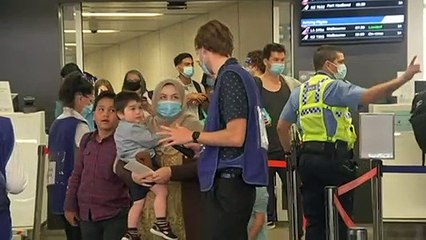 Passenger caps into Australia halved, masks mandatory on all flights