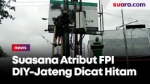 Suasana Atribut FPI DIY-Jateng Dicat Hitam sebelum Diturunkan oleh Aparat Gabungan di Sleman