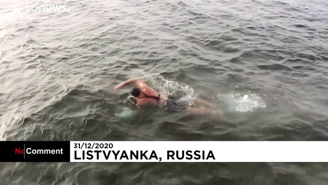 Russians brave an icy dip in Siberia's Lake Baikal ahead of new year