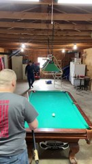 Man Bamboozles Son with Pool Trick Shot Gag