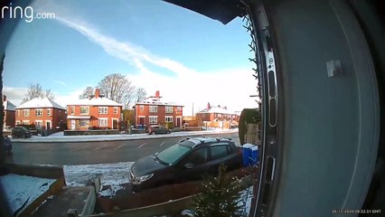 Woman Slips on Slick Driveway