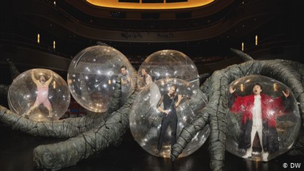 Keeping a distance – artists in PVC bubbles