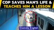 Cop saves man from getting crushed, teaches a lesson: Watch | Oneindia News