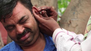 Ear Waxing - Traditional ear cleaner in India