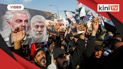 Video herunterladen: Iraqi militia supporters demonstrate on anniversary of Soleimani's killing